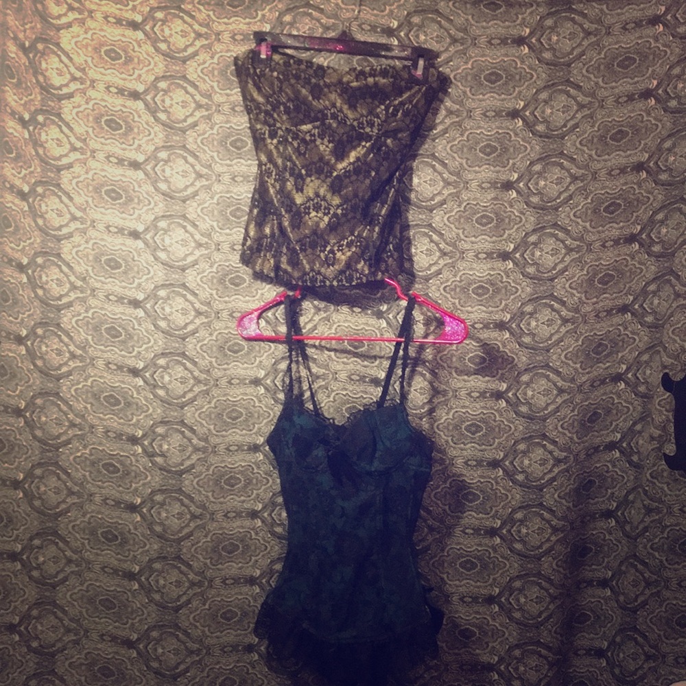 Least corset with gold and black laced tube top.